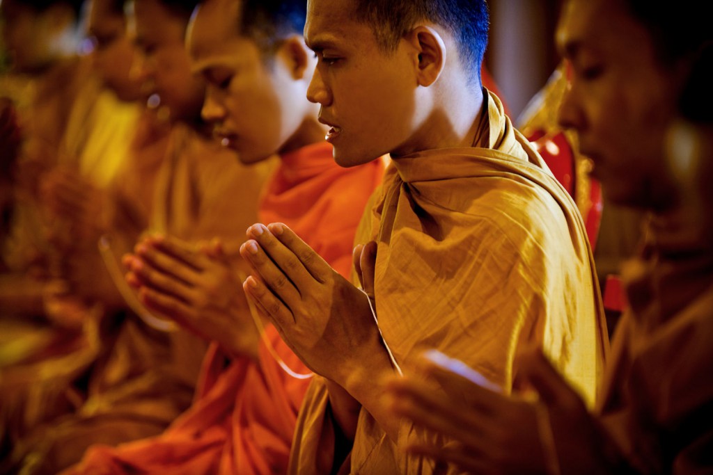 Buddhist Monks Praying at a Monastery