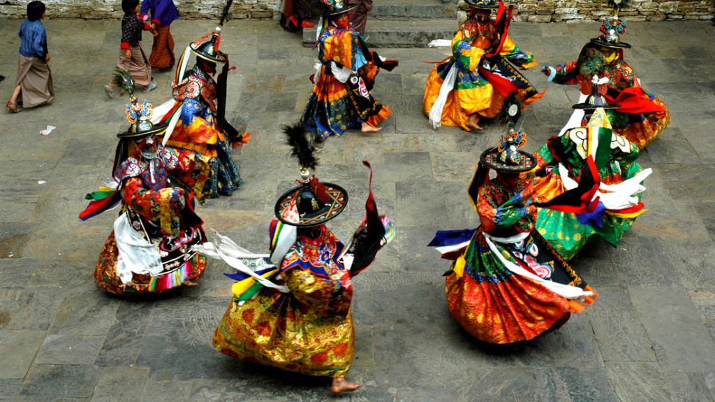 Monks performing yhe masked dance - the Cham dance